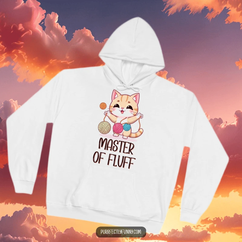 Funny cat energetically juggling three balls of yarn, perfect for a cozy and humorous hoodie design.
