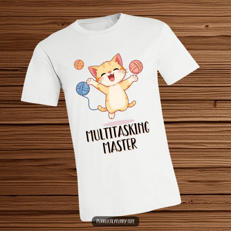 Funny t-shirt with a cat energetically juggling yarn balls mid-leap, capturing playful skill and joy, a great gift idea.